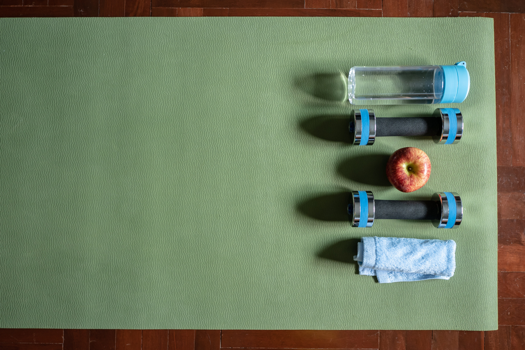 Gym equipment on yoga mat